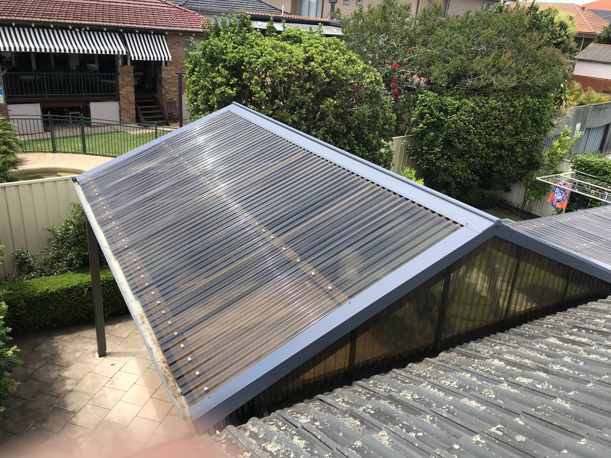 Polycarbonate roof and flashings