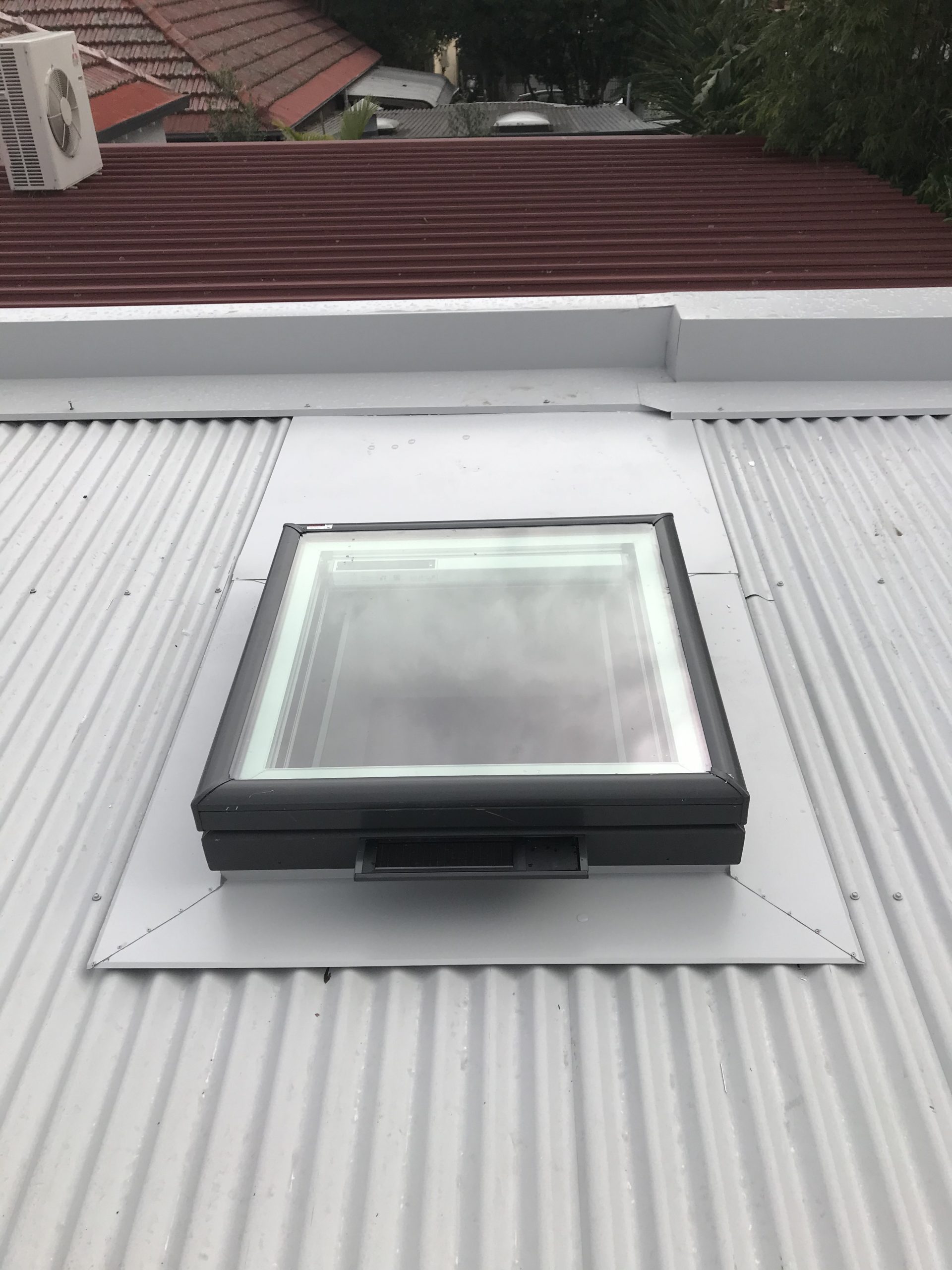 Roof and flashings and skylights